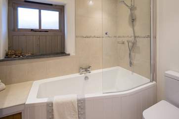 The second bedroom's stylish en suite bathroom.