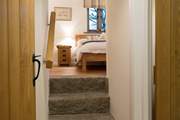 The granite steps that lead up to Bedroom 1, add to the overall character of the Barn.