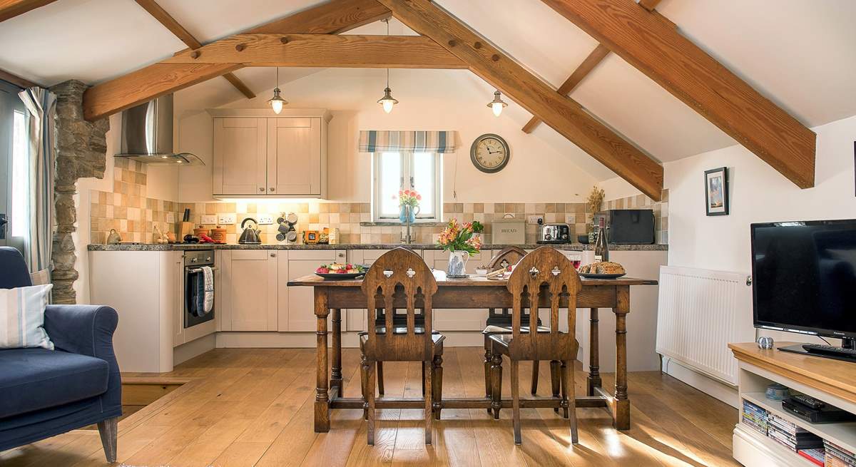 Wooden floors and exposed beams, add to the character of Molly's Barn.