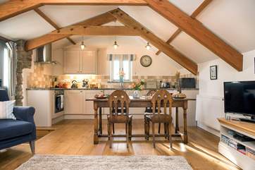 Wooden floors and exposed beams, add to the character of Molly's Barn.