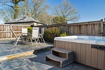 You are sure to enjoy time relaxing in the hot tub.
