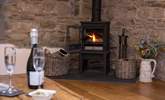 The cosy wood-burner makes this an ideal retreat all year round. - Thumbnail Image