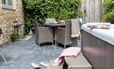 The lovely outside patio is perfect for relaxing on holiday. - Thumbnail Image