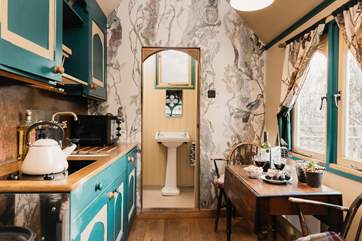The pretty shower-room sits at the end of the hideaway.