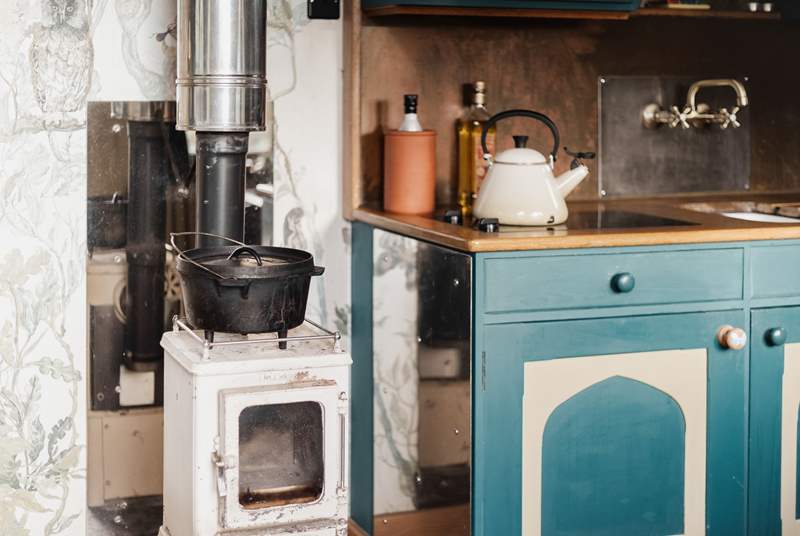 Keep toasty throughout the seasons or cook over the wood-burning stove.