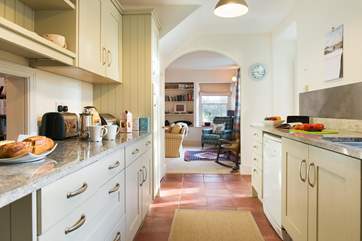 The house has a lovely open feel, with the sitting-area leading off from the kitchen.
