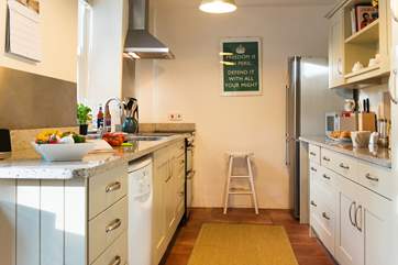 The kitchen is well-equipped and presented to a high standard.