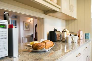 The hatchway through to the dining-area makes it easy to serve up at mealtimes.