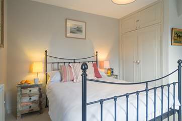 The master bedroom is beautifully styled...