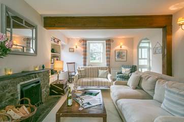 The sitting-room is wonderfully light and airy.