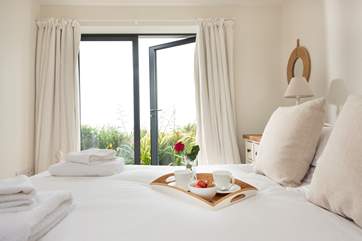 The master bedroom at Windjammer- wake up and watch the boats bob by.