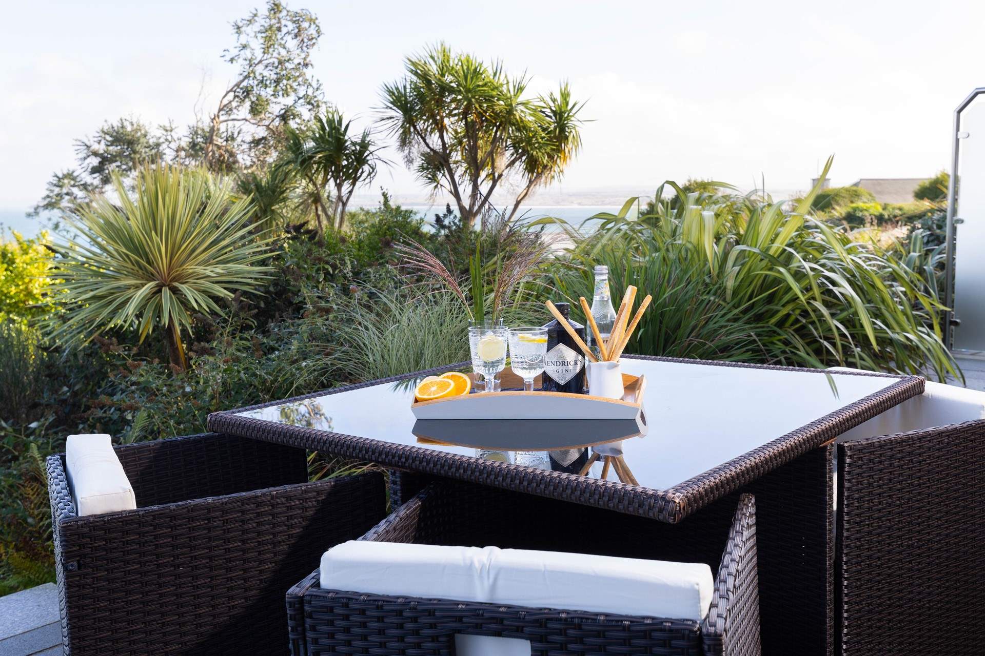 Welcome to Windjammer. Tropical gardens and blue seas are the views from the huge terrace at this luxury apartment.