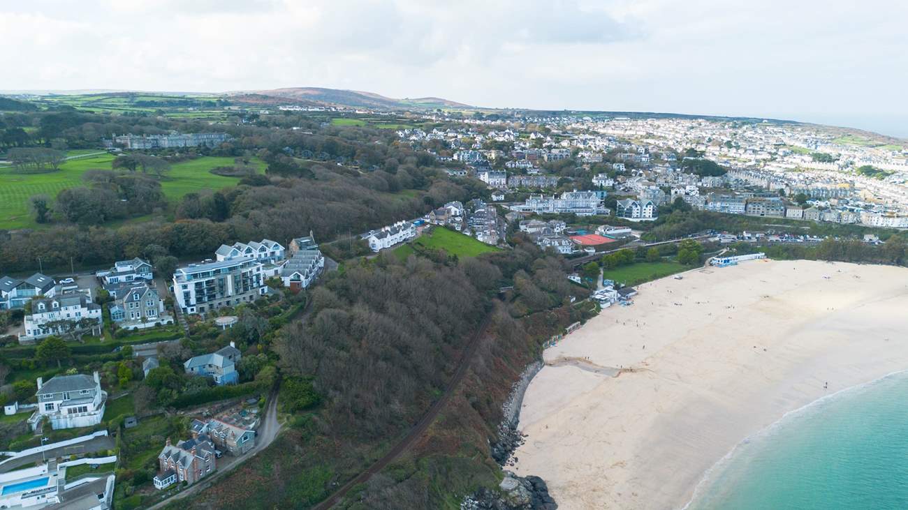 Morwenstow apartments can be seen on the left, with the soft sand and turquoise waters at Porthminster beach below.