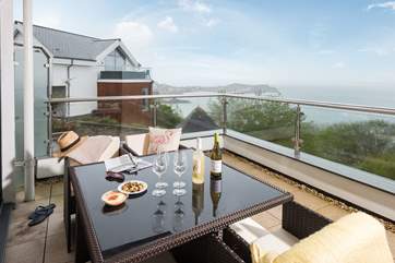 The balcony is furnished beautifully.