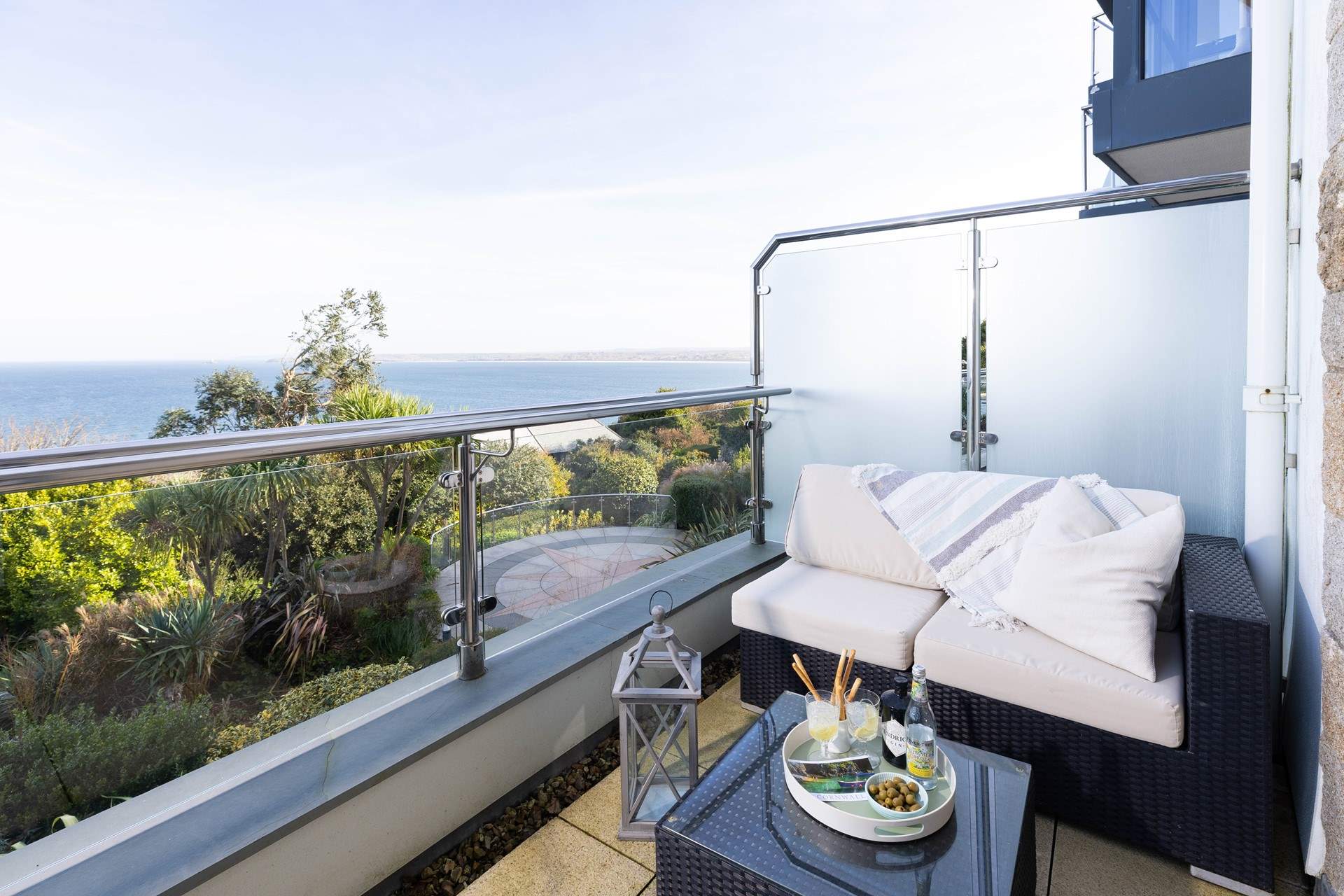 The stunning terrace extends outside bedroom 1.