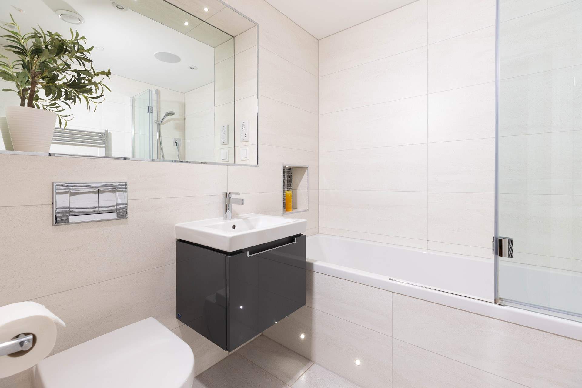 A beautiful family bathroom to soak away the sandy day.