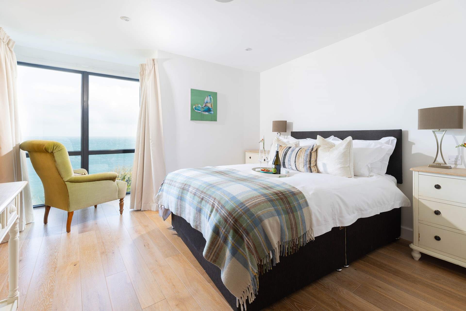 Sink into the sumptuous bed in the modern, luxury apartment with beautiful views.
