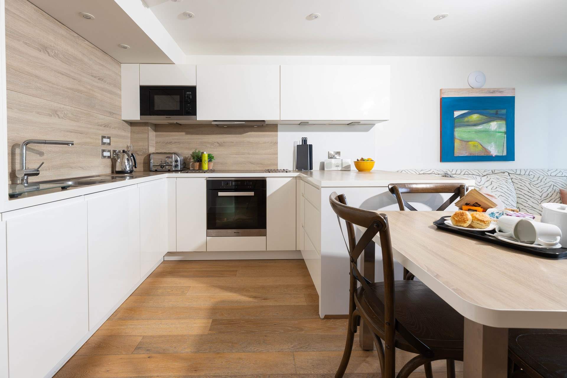 A sleek kitchen with luxury appliances, perfect to cook up a feast for the family.