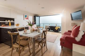 The bi-fold doors can be opened wide so you can fully appreciate the view.