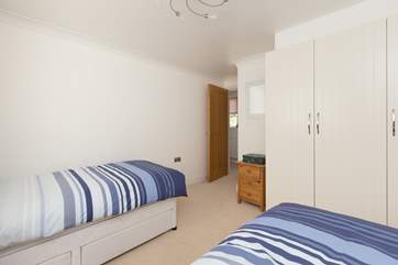 Another view of the twin bedroom. This room also has plenty of storage space.