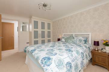 This is the master bedroom with its king-sized bed.