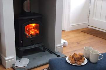 On cooler days, you can keep toasty around the cosy wood-burner with your cup of cocoa.