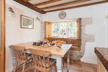 There is plenty of room for the dining-table.