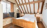 This is the double bedroom which has views to the front of the cottage and across the valley. - Thumbnail Image