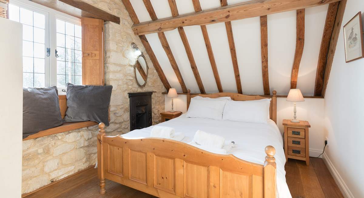 This is the double bedroom which has views to the front of the cottage and across the valley.