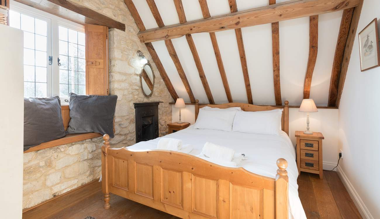 This is the double bedroom which has views to the front of the cottage and across the valley.