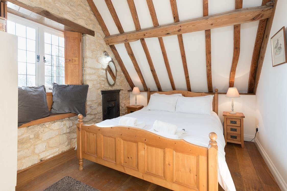 This is the double bedroom which has views to the front of the cottage and across the valley.