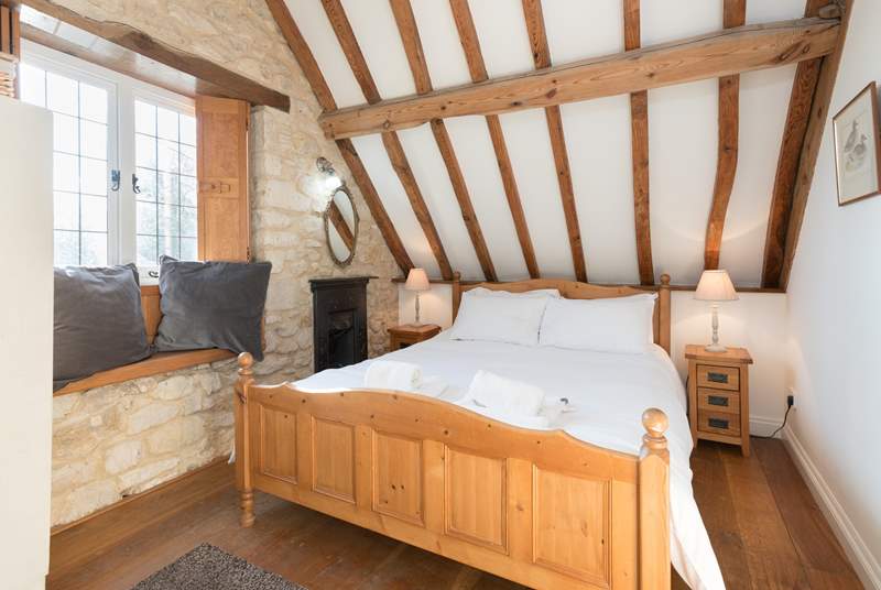 This is the double bedroom which has views to the front of the cottage and across the valley.