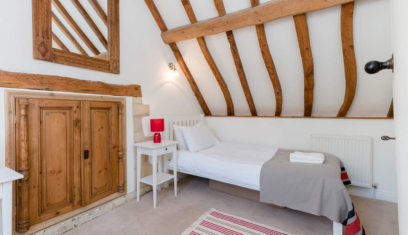 The twin bedroom has plenty of space.