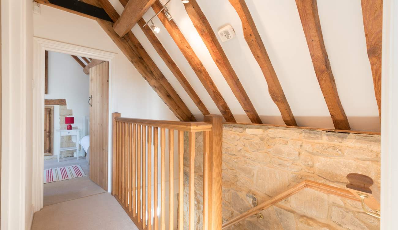 The two bedrooms are at opposite ends of the first floor corridor.