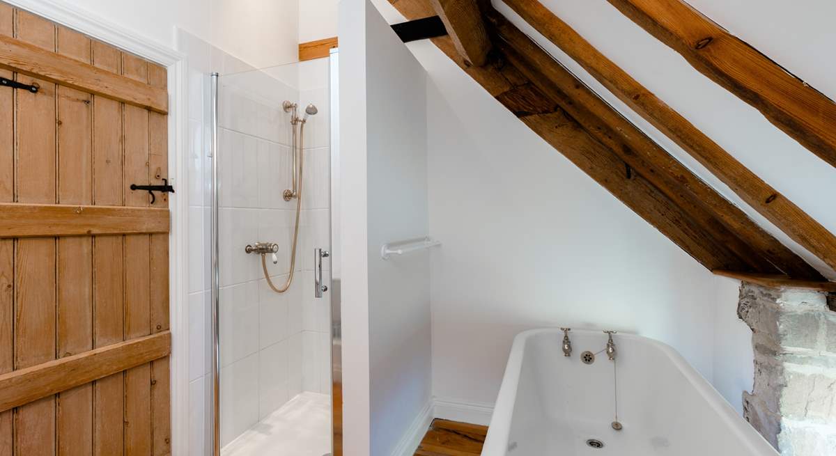 The family bathroom, with roll top bath and separate shower cubicle.