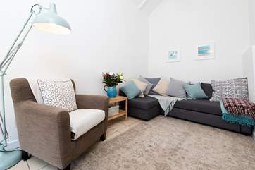 There is plenty of room to relax in the cosy sitting-area, complete with under-floor heating to keep you toasty warm in the cooler months.