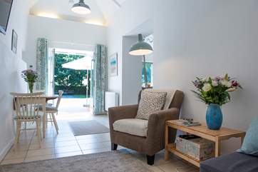 French doors lead out from the living-area to the spacious and well maintained garden.