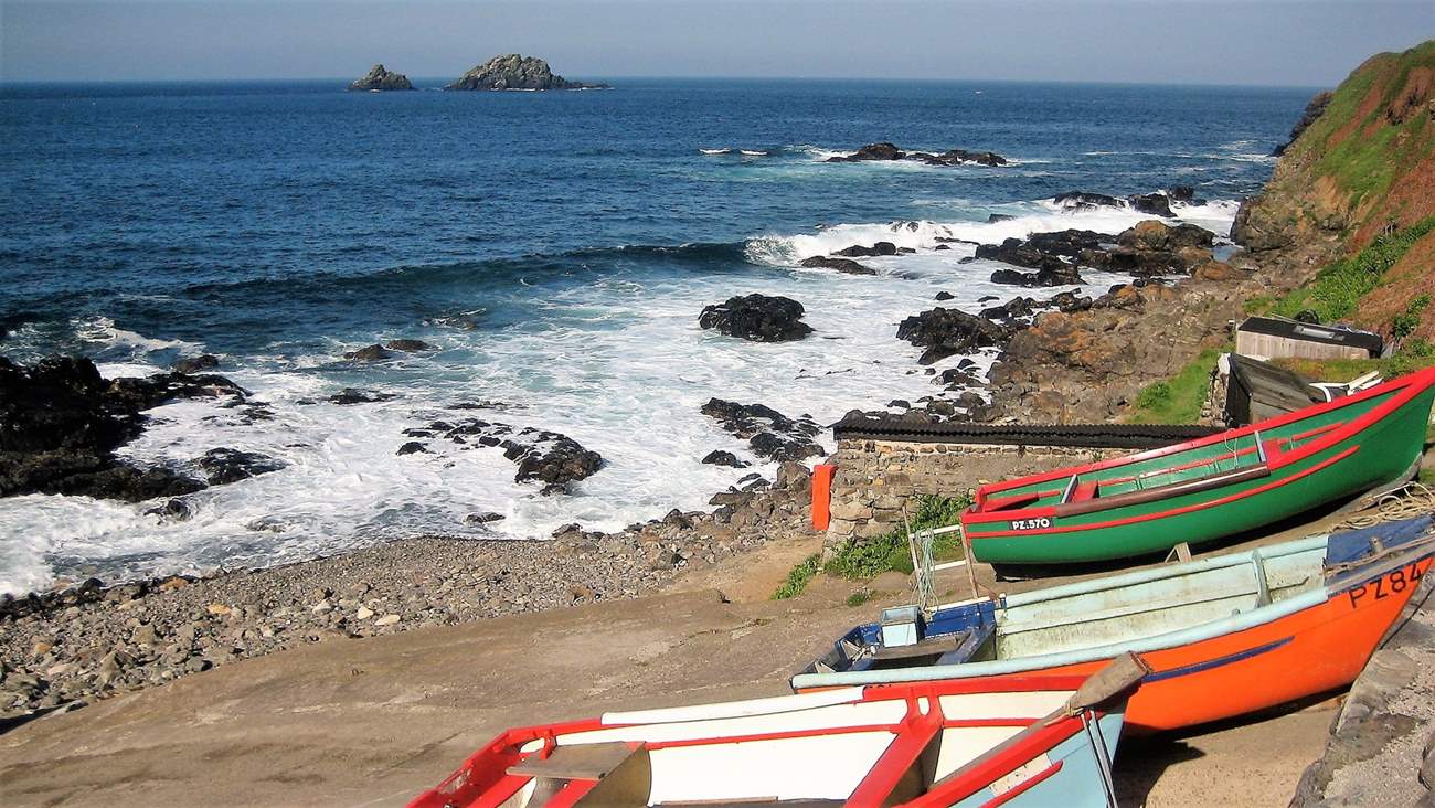 Colourful fishing boats in the cove at Cape Cornwall.