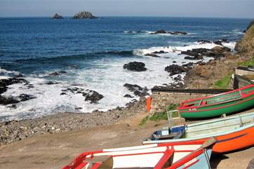 Colourful fishing boats in the cove at Cape Cornwall.