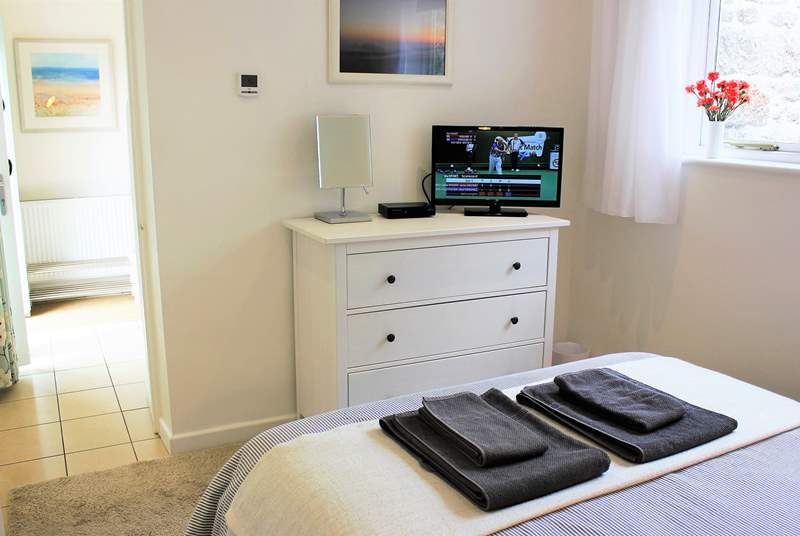 A TV in the bedroom for those long lazy lie-ins.