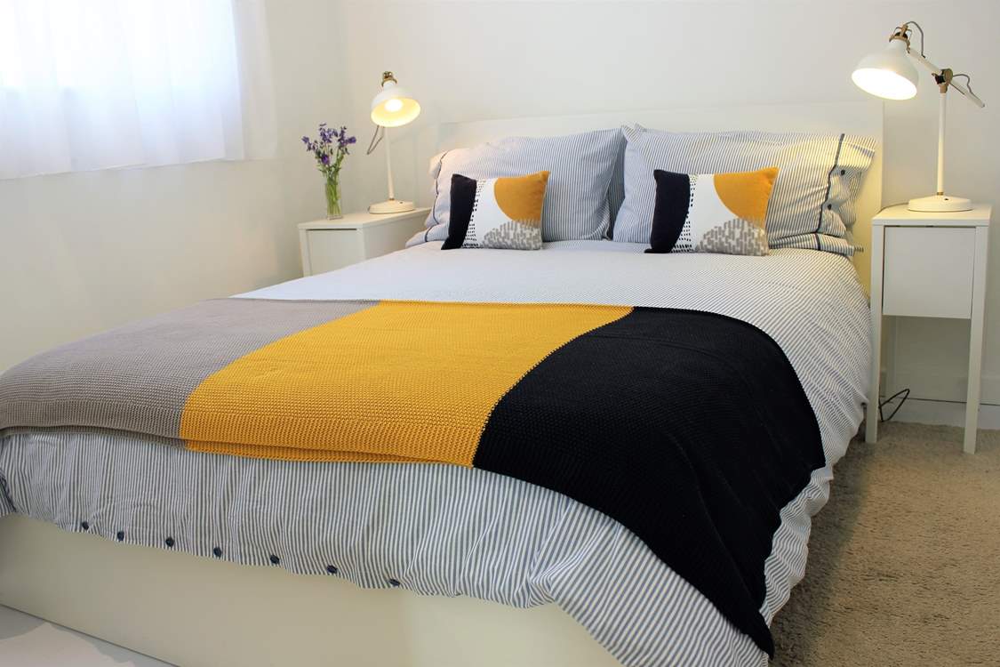 A restful night is assured in the comfortable king-size bed.