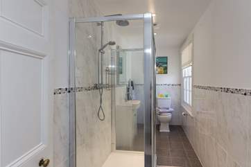 There are two bathrooms - one with a large shower and the other with a bath and shower over. Both are a really good size.