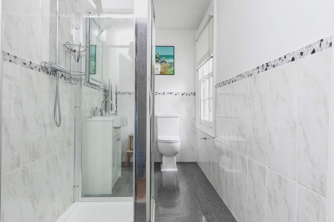 There are two bathrooms - one with a large shower and the other with a bath and shower over. Both are a really good size.