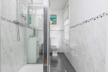 There are two bathrooms - one with a large shower and the other with a bath and shower over. Both are a really good size.