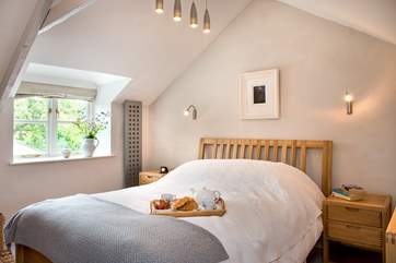 The double bedroom enjoys views over the back garden.