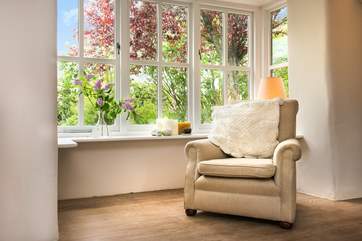A lovely spot to sit and enjoy views of the front garden (as the cottage is fairly private the cottage has no curtains in the downstairs rooms).