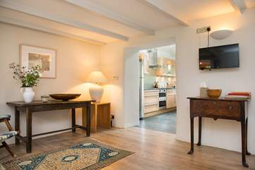 The kitchen leads off from the sitting-area.