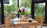 Enjoy breakfast in the conservatory, or just relax there and enjoy the sound of the birds. - Thumbnail Image