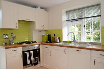 The kitchen has everything you need to create a delicious meal.