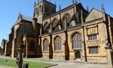 Sherborne Abbey is a grand Norman style church with a few remaining Saxon features. - Thumbnail Image